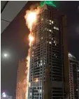  ?? Foto: Nicolas Routtier, dpa ?? Der Torch Tower in Dubai brannte ab seiner Mitte.