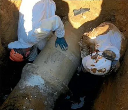  ?? SUPPLIED ?? Watercare workers spend their anniversar­y weekend fixing a damaged pipe in Milford.