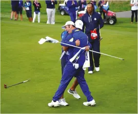  ??  ?? The Canyons Course, Bighorn GC [above]; Rahm defeats Tiger Woods in the Ryder Cup singles in 2018