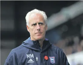  ?? EPA; Getty ?? Arsene Wenger will complete almost 22 years at Arsenal when he steps down at end of the season. Mick McCarthy, left, recently quit Ipswich Town where he was manager since 2012