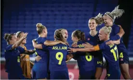  ?? Photograph: Ayman Aref/NurPhoto/Shuttersto­ck ?? Sweden’s women’s football team celebrate after reaching the Olympic final which has been moved due to heat concerns.