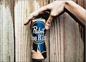  ?? EDGAR GARCIA PHOTO ?? Pabst has created a hard coffee that looks and tastes like iced coffee, and put it in a can.