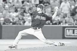  ?? MARK BLINCH/THE CANADIAN PRESS VIA AP ?? Indians starting pitcher Ryan Merritt throws against the Blue Jays during the first inning of Game 5 of the ALCS on Wednesday in Toronto.