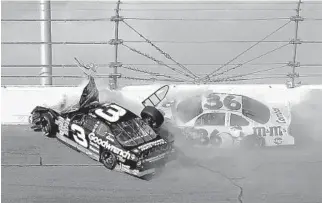  ?? SENTINEL JACOB LANGSTON | ORLANDO ?? Dale Earnhardt (3) crashes into the wall in Turn 4, in front of the car of Ken Schrader on the last lap of the 2001 Daytona 500. Earnhardt, a seven-time NASCAR Cup champion, died at the age of 49.