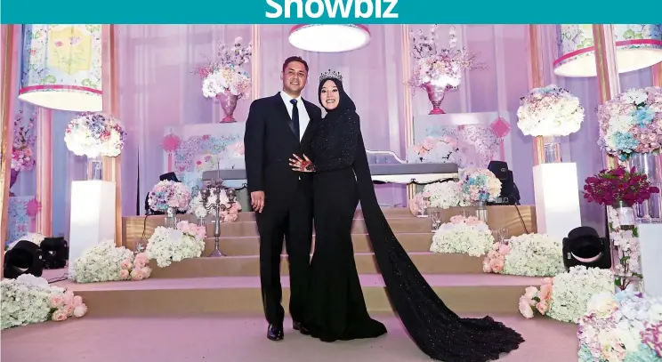  ?? — Photos: IZZRAFIQ ALIAS/The Star ?? Shila wanted to wear black at her wedding reception as she felt it was ‘rare and unique.’