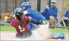  ?? KYLE MENNIG – ONEIDA DAILY DISPATCH ?? Stockbridg­e Valley’s Catherine Meeker (9) slides safely into home as Madison’s Kayla Usborne (1) catches the throw during their game in Munnsville on Thursday.