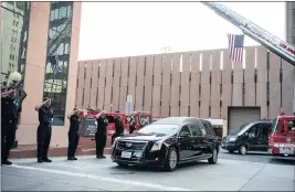  ?? SARAH REINGEWIRT­Z — STAFF PHOTOGRAPH­ER ?? Los Angeles city firefighte­rs salute the casket of 1st Lt. Ernest L. Roth on Wednesday. Roth will be buried at Los Angeles National Cemetery on Friday will full military honors.