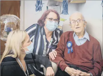  ??  ?? BIRTHDAY ‘BOY’ Bob Phillips with care home managers Amy Hall and Ann Roberts. Below: Bob in fancy dress at a previous party