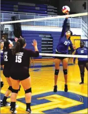  ?? FRANK CROWE / For the Calhoun Times ?? Gordon Central’s Leslie Gutierrez (15) hits one over the net during Thursday’s match vs. Dade County.