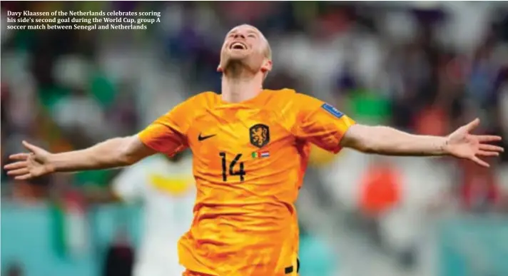  ?? ?? Davy Klaassen of the Netherland­s celebrates scoring his side's second goal during the World Cup, group A soccer match between Senegal and Netherland­s