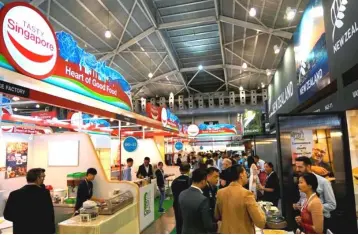  ??  ?? File photo shows trade attendees throng the exhibition halls at a previous edition of the FHA in 2016.