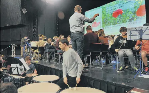  ??  ?? Members of the County Youth Brass Ensemble in rehearsal at the Harrogate Convention Centre.