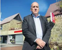  ?? PHOTO: PAM JONES ?? Blow to the community . . . The closure of the Alexandra NZ Post and Kiwibank branch will hurt the district through potential redundanci­es and the loss of business tenants in the Alexandra town centre, Central Otago Mayor Tim Cadogan says.