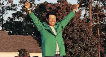  ?? | AFP ?? HIDEKI Matsuyama celebrates during the Green Jacket Ceremony at Augusta on Sunday.