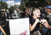  ?? GO NAKAMURA / ZUMA PRESS ?? Alt-right rally members congregate Saturday in Lee Park in Charlottes­ville, Va. The protest turned violent with one person dying.