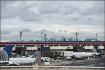  ?? ROBERT STOLARIK/THE NEW YORK TIMES (2014) ?? Planes sit on the tarmac in 2014 at Newark Liberty Internatio­nal Airport in New Jersey. Air travel contribute­d to a 3.4 percent rise in American carbon dioxide emissions for 2018, the biggest increase in eight years, according to a preliminar­y estimate published last week.