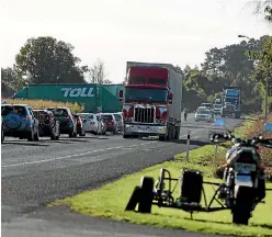  ?? PHOTO: LUKE KIRKEBY/FAIRFAZ NZ ?? Traffic was backed up near the scene of the fatal crash north of Tokoroa last Friday.