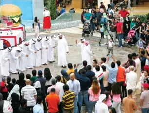  ?? Photo by Ryan Lim ?? Traditiona­l Emirati dance at Yas Mall in Abu Dhabi during the celebratio­n. —