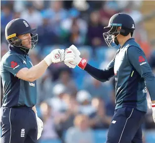  ?? Reuters ?? England’s Eoin Morgan with Joe Root during their match-winning partnershi­p against India. Former England spinner Phil Tufnell thinks both countriers are favourite for the 2019 World Cup, —