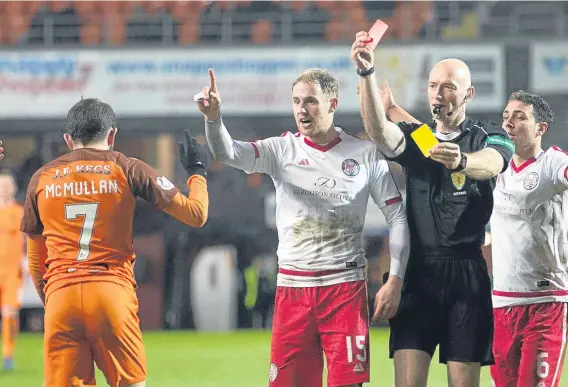  ??  ?? Dundee United winger Paul McMullan is sent off for simulation by referee Alan Newlands at Tannadice yesterday.