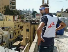  ?? MOHAMAD CHEBLAK ?? AN MSF team is carrying out door-to-door visits to the residents of Karantina in Beirut, offering support and assessing the medical needs of the residents. |
