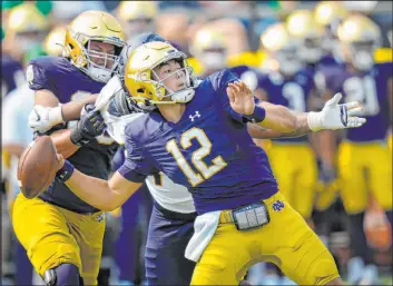  ?? AJ Mast The Associated Press ?? Notre Dame quarterbac­k Tyler Buchner makes his first career start Saturday, and it’s no easy task: against No. 2 Ohio State at the Horseshoe in Columbus, Ohio.