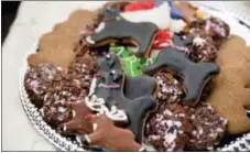  ?? ANDREW HARNIK — THE ASSOCIATED PRESS ?? Holliday cookies are put out during a preview of the 2016 holiday decor, Tuesday in Washington.