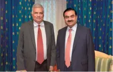  ?? TWITTER ?? Expanding scope: Gautam Adani met Sri Lanka President Ranil Wickremesi­nghe in July 2023 regarding business projects.