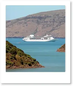  ?? DEAN KOZANIC/STUFF ?? Akaroa sits on a magnificen­t bay where cruise ships anchor.