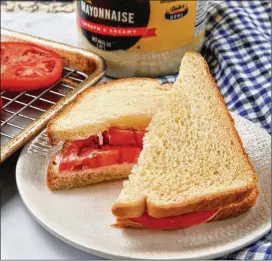  ??  ?? Duke’s mayonnaise and Sunbeam white bread are can’t-miss choices if making a Classic Tomato Sandwich.