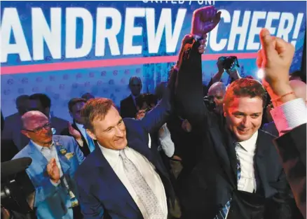  ?? FRANK GUNN LA PRESSE CANADIENNE ?? Deuxième l’an dernier dans la course à la chefferie du Parti conservate­ur, Maxime Bernier avait célébré la victoire de son adversaire Andrew Scheer devant les partisans.