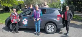  ?? ?? South Taranaki Neighbourh­ood Support volunteers, from front left: Mary Schrader, Val Harrison (in car front seat) Carol Curtis, Tanya Grant (rear seat), Luke Ryan-Henderson, developmen­t coordinato­r Wendy Foreman and Tony Milham with Vanessa Sumpter from Tasman Toyota (right).