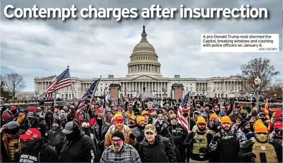  ?? ?? THE House committee investigat­ing the January 6 US Capitol insurrecti­on has voted to pursue contempt charges against Jeffrey Clark, a former justice department official who previously refused to answer the panel’s questions.
The committee voted 9-0 to pursue criminal charges against Mr Clark, who aligned with Donald
A pro-Donald Trump mob stormed the Capitol, breaking windows and clashing with police officers on January 6
JON CHERRY