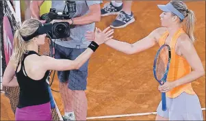  ?? "1 1)050 '3"/$*4$0 4&$0 ?? Eugenie Bouchard from Canada, left, shakes hands with Maria Sharapova from Russia at the end of their Madrid Open tennis tournament match in Madrid, Spain, Monday, May 8, 2017. Bouchard won 7-5, 2-6 and 6-4.