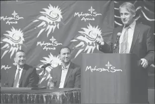  ?? COURANT FILE ?? Curt Miller, left, is introduced as coach of the Sun in 2015 by team CEO Mitchell Etess and then-general manager Chris Sienko, center. Miller had a long-term plan that took a contract extension to come to fruition.