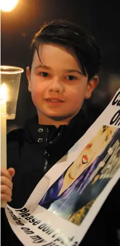  ?? Picture: Ken Finegan ?? Cathal Gallagher at the Candleligh­t vigil held the the Market Square earlier this year.