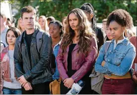  ?? DAVID MOIR / NETFLIX ?? Dylan Minnette (left), Alisha Boe and Grace Saif in the Netflix series “13 Reasons Why.”