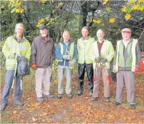  ??  ?? Team work Seven volunteers from the Blairgowri­e and Rattray Access Network set about trimming back woody growth on the popular Gallowbank path from its junction with Newton Street through to Dunkeld Road