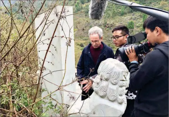  ?? PHOTOS PROVIDED TO CHINA DAILY ?? Robert Lawrence Kuhn in Hainan province in November 2017 for his documentar­y and CGTN TV series.