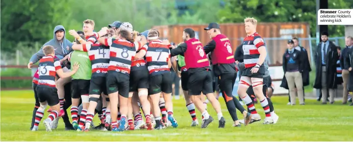  ?? ?? Stunner County celebrate Holden’s winning kick