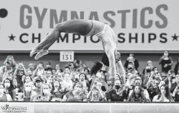  ?? Jamie Squire / Getty Images ?? Simone Biles’ score of 14.35 on the balance beam was the best of any gymnast Friday at the USA Gymnastics championsh­ips in Fort Worth. Her total score of 59.55 bested Sunisa Lee by 2.2 points.