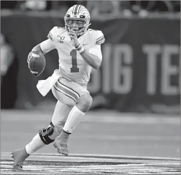  ?? AP FILE PHOTO ?? In this Dec. 7, 2019, file photo, Ohio State quarterbac­k Justin Fields (1) runs with the ball against Wisconsin during the first half of the Big Ten championsh­ip game in Indianapol­is. The Big Ten announced Tuesday it won’t play football this fall because of concerns about COVID-19, becoming the first of college sports’ power conference­s to yield to the pandemic. The Pac-12 announced later Tuesday that it won’t play its fall season either.