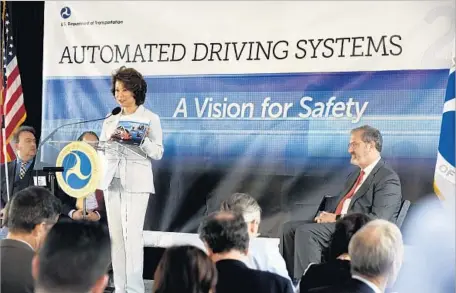  ?? Max Ortiz Associated Press ?? U.S. TRANSPORTA­TION Secretary Elaine Chao announces new voluntary safety guidelines for self-driving cars in Ann Arbor, Mich.