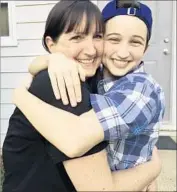  ?? Transgende­r Law Center ?? ASHTON WHITAKER, a senior at Tremper High School in Kenosha, Wis., with his mother, Melissa. He first asked to use the boys’ bathroom as a sophomore.