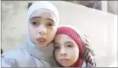  ??  ?? A screen grab of Syrian sisters Noor and Alaa Alkhateed.