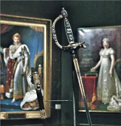  ?? PHOTOS BY JIANG DONG / CHINA DAILY ?? A collection of French treasures, including the Consular Sword (above left), will be part of a display of nearly 300 precious objects at the Palace Museum in Beijing from Tuesday.