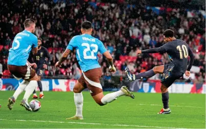  ?? ?? England’s Jude Bellingham snatches an equaliser in added time against Belgium at Wembley