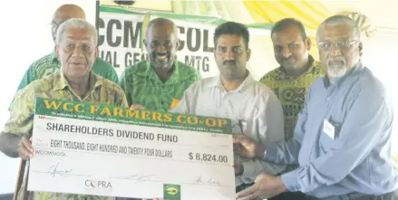  ?? Photo: Payal Sharma ?? From left: A dairy farmer, Filimoni Naicavu holding the shareholde­rs dividend cheque with manager central division (cooperativ­e department) Ramesh Chand, Kirpal’s Accounting Services auditor Vidya Kirpal, WCC Farmers secretary Joseva Madraitabu­a...