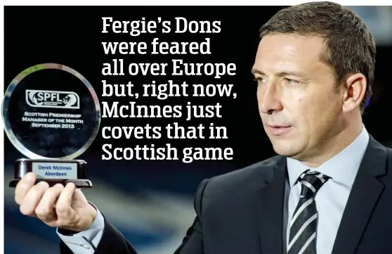  ??  ?? Eyes on the prize: Derek McInnes received the Manager of the Month award for September but needs Aberdeen challengin­g for trophies