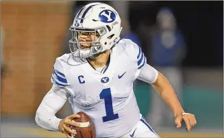  ?? RICHARD SHIRO/ASSOCIATED PRESS ?? BYU’s Zach Wilson raised his stock with a big junior season and then declared for the draft. He completed 73.5% of his passes for 3,692 yards and 33 TDs, with only three intercepti­ons.